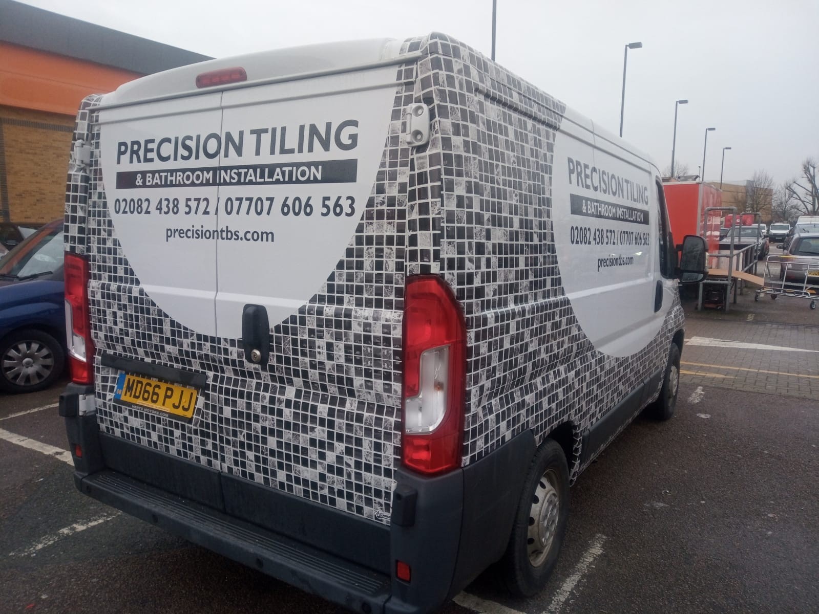 Precision Tiling & Bathroom Installation wrapped transit van
