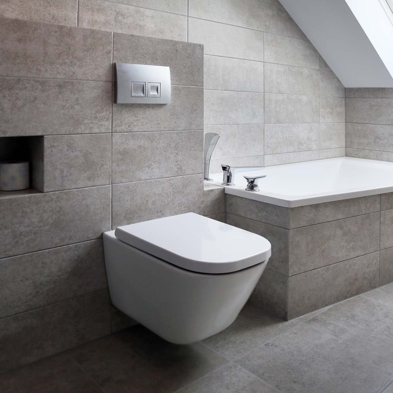 A modern style bathroom with gray tiles in a modern house.